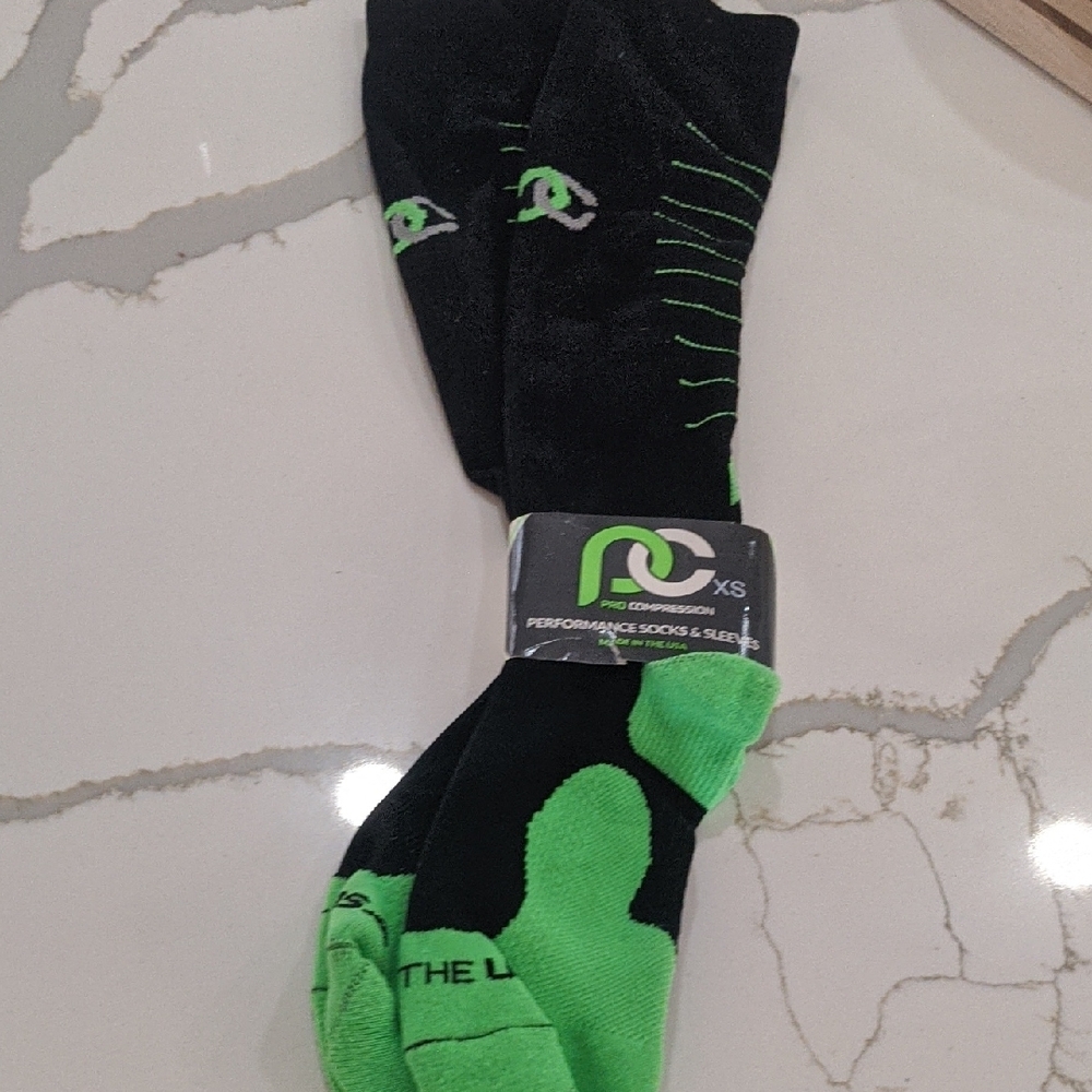 Pro Compression Black and Green Socks.Made in the USA- Size XS